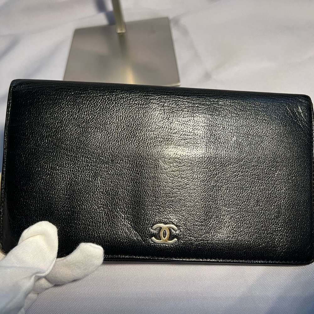 Chanel black caviar leather bi-fold wallet